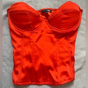 Satin orange corset size medium from fashionova